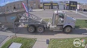 CCTV clip of a semi truck speeding into cars and an auto mall