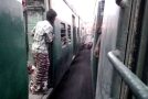 Crazy man jumps between trains going at 70km/hr