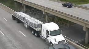Driver cuts off a semi truck, gets what he deserves