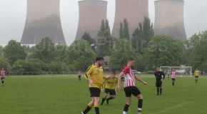 Football players have their match interrupted by a power station demolition