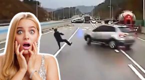 Man dodges car after car in a highway car pileup