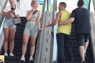 Touching people’s hands on an escalator prank