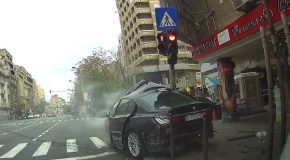 BMW tries to escape from the cops and ends up in a horrible accident