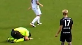 Football referee falls to his knees after the team fails to play the advantage