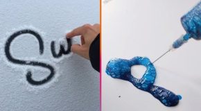 Calligraphists in action with satisfying results