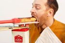 Man feeds himself a 5-course meal using a conveyor belt