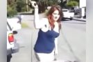 Woman threatens her neighbors using a hammer