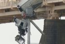 Dashcam video features a semi truck nearly falling off a bridge