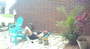 Man has his garden chair break under him