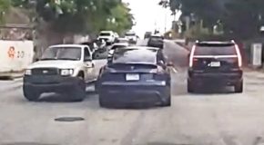 Intense police car chase involves the police shooting at and finally arresting the suspects