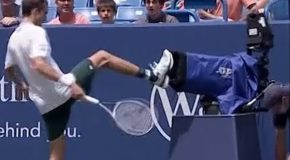 Medvedev kicks a TV camera after crashing into it during a tennis match