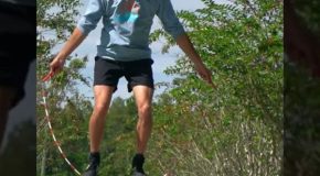 Man shows off his amazing skill of balancing and jumping rope at the same time