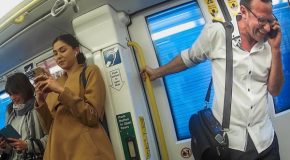 Man spreads laughter inside a train