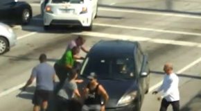 Unconscious driver gets saved by a group of strangers