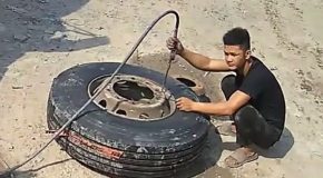 Man Inflates A Tyre Too Much Until It Explodes