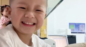 Little Chinese Boy Smiles Through The Pain Of Getting His Blood Drawn