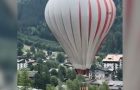 Crazy Hot Air Balloon Stunt Involves A Woman Being Pulled Up By It